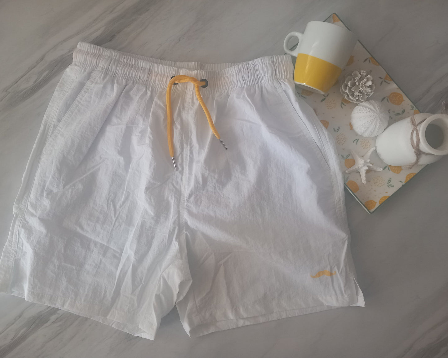 ⚪ Short de Bain Moustache Beachwear - Blanc Pur 🤍
Élégant et intemporel, notre short de bain blanc est un indispensable pour un look chic et décontracté. Son tissu doux et respirant sèche rapidement, offrant un confort optimal tout au long de la journée. Idéal pour une allure raffinée en bord de mer.

🩳 Tailles disponibles : S, M, L, XL, XXL
💦 Léger, fluide et agréable à porter
🔥 Un style minimaliste qui fait la différence

➡️ Soyez stylé en toute simplicité ! Disponible dès maintenant.